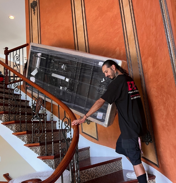 Movers carrying sofa