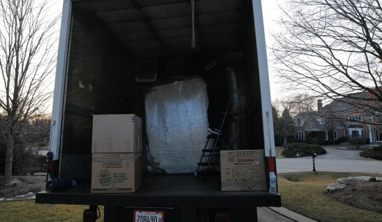 Moving truck in residential driveway Bolingbrook